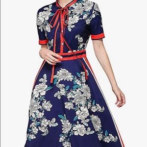 New. Multicolored dark blue, red and floral dress.